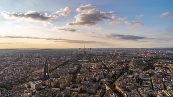 Paris, France, Timelapse - Wide angle view of Paris as seen from the Montparnasse tower at sunset