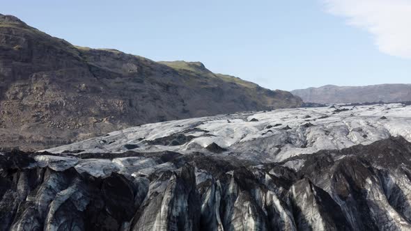Beautiful Glacier Formations of Solheimajokull in Iceland - aerial shot alt