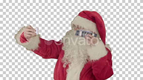 Santa Claus holding a big present doing, Alpha Channel