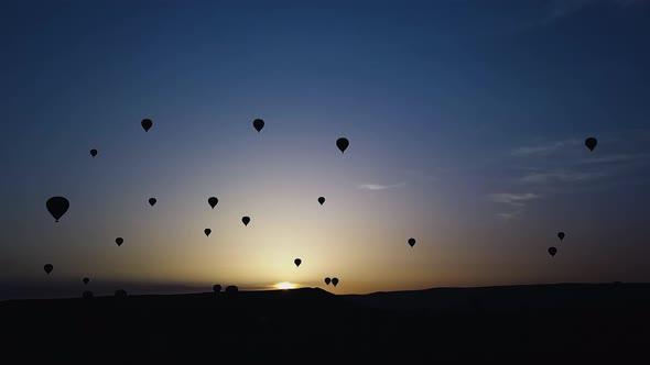 Hot Air Balloons Hover Over the Valley