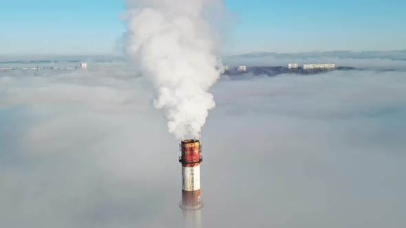 Aerial drone view of Chisinau. Tube of the thermal station with smoke coming out alt