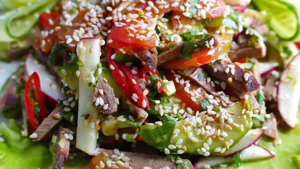 Warm Salad with Meat Vegetables and Sesame