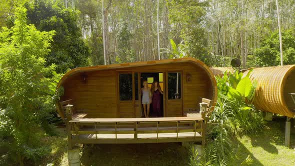 Attractive Girl Models Out From Their Capsule Like Room River View Resort alt