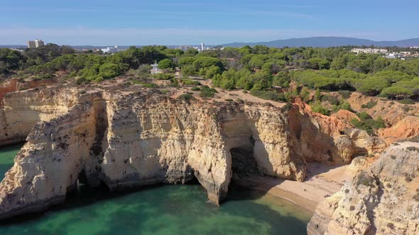Delightful Aerial View of Portuguese Rocky Beaches Near the City of Portimao alt