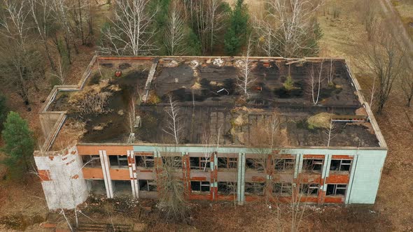 Aerial View Of Abandoned Former Administrative Building In Chernobyl Zone. Nuclear Chornobyl