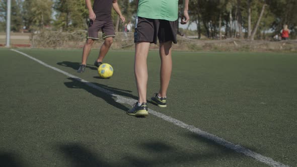 Football Team Players Making Kick-off in the Pitch alt