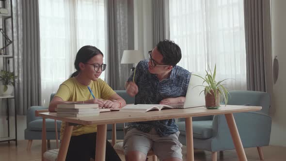Angry Asian Father Teach His Daughter To Do Homework At Home alt