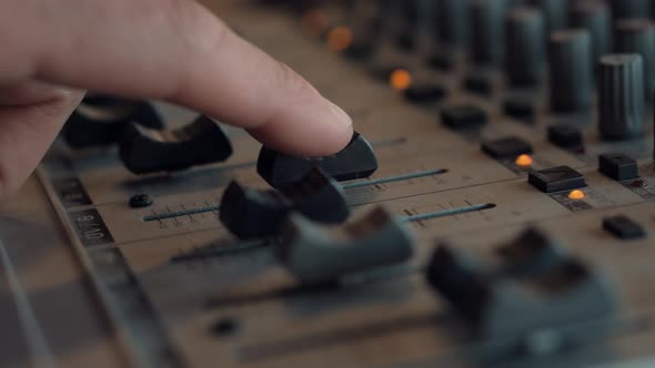 Digital Audio Mixer Soundboard In Production Studio.Sound Engineer Moving Sliders In Radio Station. alt