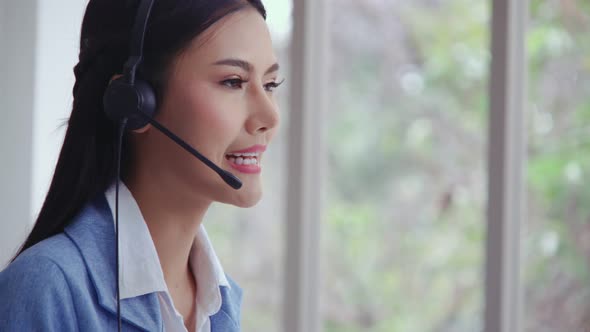 Customer Support Agent or Call Center with Headset Talking to Customer on Phone alt