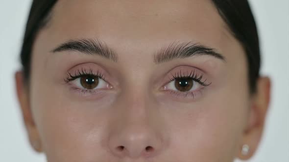 Close Up of Shocked Latin Woman White Background alt