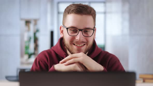 Man Using Laptop for Video Chat