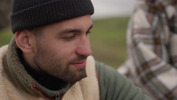 Man In Woolly Hat Looking Away In Thingvellir alt