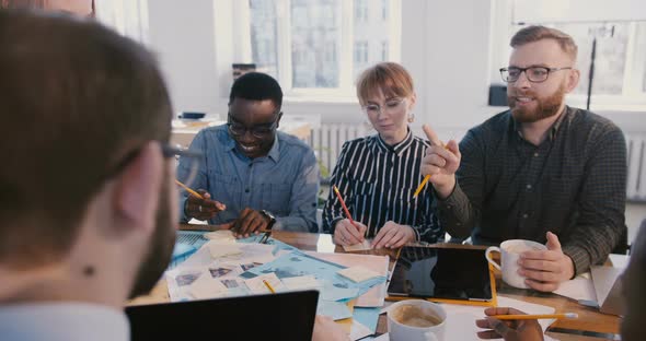 Successful Young Confident Female Team Leader Motivating Happy Multiethnic Company Employees at alt