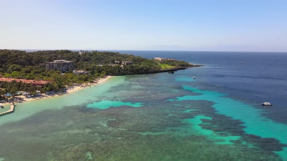 Drone footage of the beautiful Roatan island, Honduras. West Bay side. alt