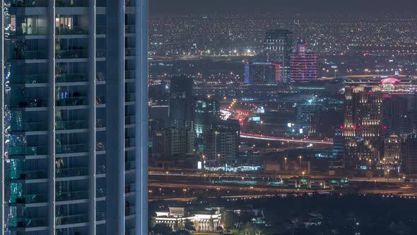 Aerial View of Neighbourhood Zabeel and Dubai Creek with Typical Old and Modern Buildings Night alt