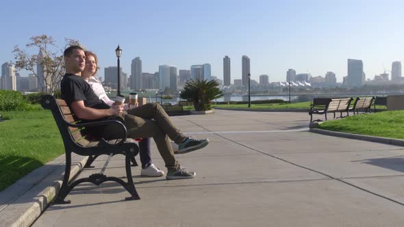Couple Relaxing on San Diego City Bench