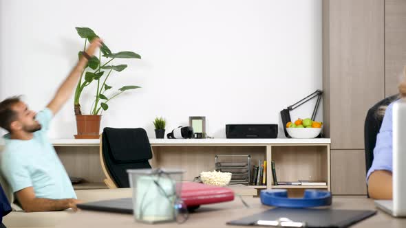 Man Watches Football Games and Makes Noise While Her Partner Tries To Work on the Computer alt