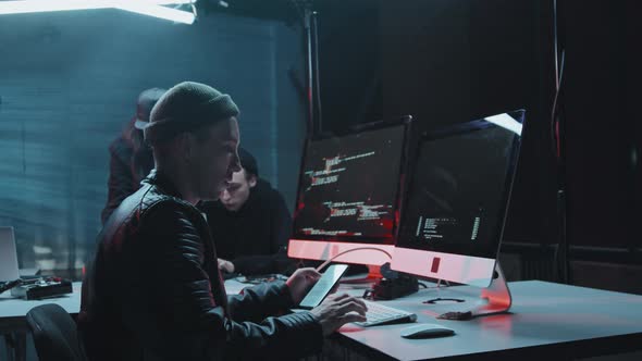 Hackers Committing Cyberattack from Dark Hideout alt