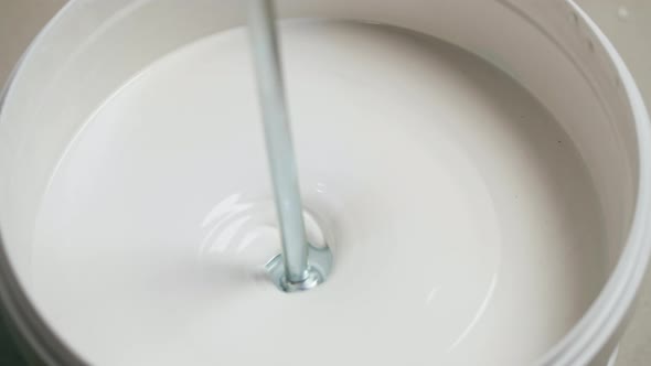Mixing White Paint Top View alt