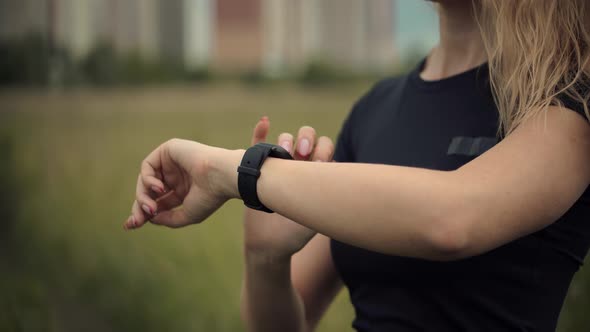 Runner Use Smart Watch. Runner Checking Pulse On Smartwatch On Running Workout. Fit Woman. alt