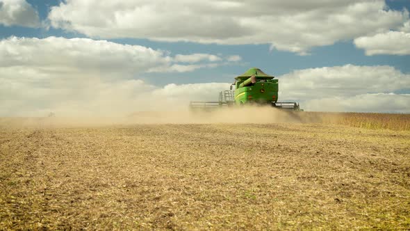Combine Harvester Leaving Soybean Field