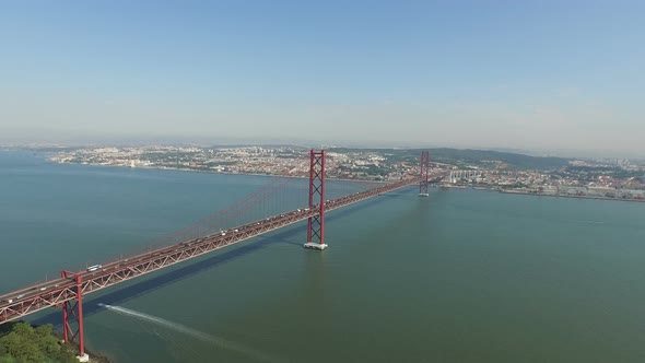 Aerial of 25th of April bridge and Christ the King monument