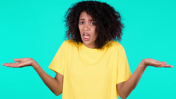 Indifferent Unsure Woman Makes Gesture of I Dont Know Cant Help Anything alt