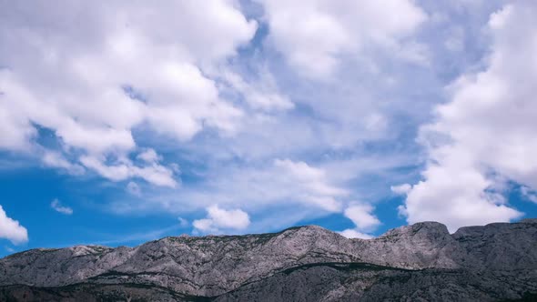 Clouds And Blue Sky Above Mountain 