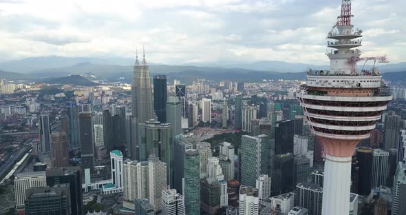 Kuala Lumpur's Downtown Aerial Footage, Drone Goes Near Menara and Shows Petronas Twin Towers