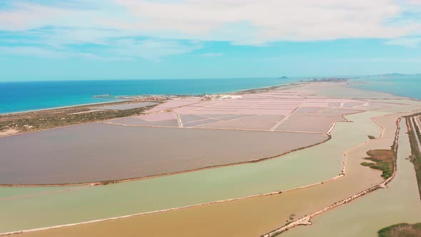Multicolored Salt Lakes with Coastal Salt Marshes, Aerial View, Video Shooting with Drone alt