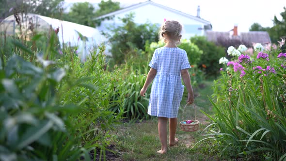 Little Girl Looking for Easter Eggs with Basket in Hand Entertainment for Children Catholic Easter alt