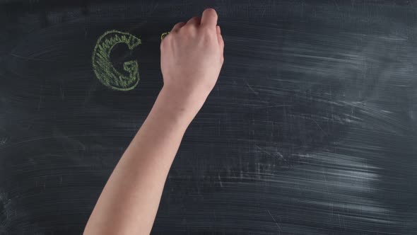 Colorful Chalks are Written the Words Girl Power on a Chalkboard Timelapse alt