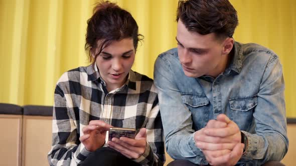 A Couple Sitting and Chatting About Something alt