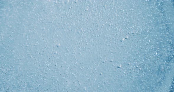 Oxygen Bubbles in Water on a Blue Abstract Background alt