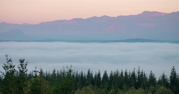 Snoqualmie Valley Washington Usa Foggy Cloud Cover Sunset Forest Mountain View Timelapse alt
