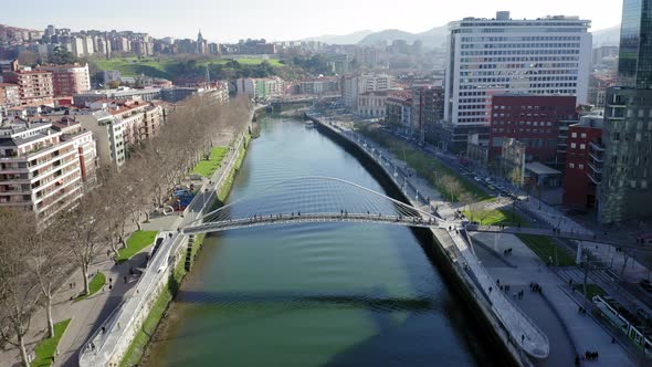 Drone view of Bilbao; beautiful cityscape of Basque country capital in sunny winter day alt