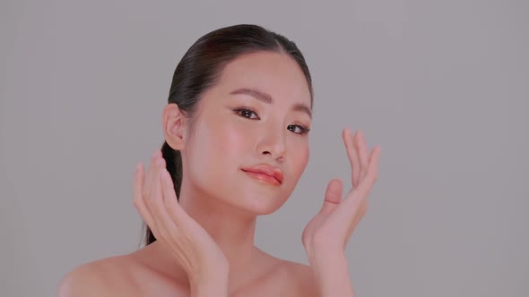 Beautiful face of Asian young woman with natural skin. Portrait of attractive girl with soft make-up alt