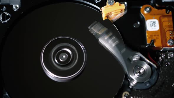 Hard Disk Drive Inside. Structure of HDD, Spinning Platter. Move Magnetic Head alt
