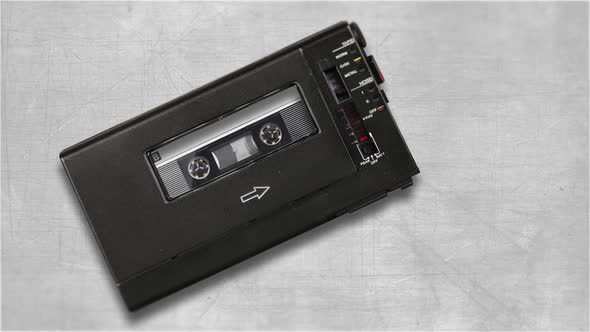 Retro audio portable tape recorder working in loop alt