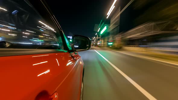 Drivelapse From Side of Car Moving on a Night Avenue in City Timelapse Hyperlapse alt