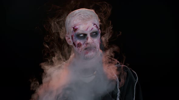 Creepy Man Scary Wounded Bloody Scars Face Halloween Undead Guy Blows Smoke From Nose Smiles alt