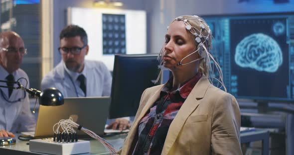 Patient Answering Doctors Questions During Brain Scan alt