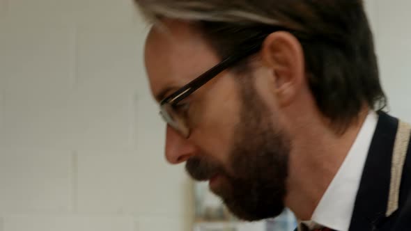 Businessman working in office 4k alt