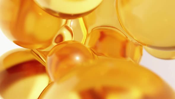 Oil Yellow Orange Abstract Background with Round Golden Spheres Close Up alt