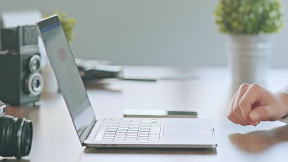 Man Working On Laptop (2K) alt