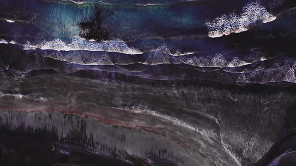 Aerial View of Beautiful Beach with View of Ocean Waves and Water Crashing on to Sandy Shore From alt