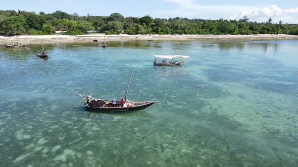Zanzibar Tanzania  Boats on Ocean Water Near the Shore alt