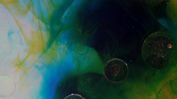 Chaotic Movement Expansion of the Flow Swirls of Yellow Green Blue and Red Colors alt