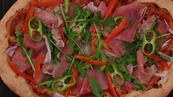 Pizza with Bacon Pepper and Arugula