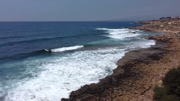 Aerial Drone Video of Rocky Beach in Paphos Cyprus Island with Waves Mediterranean Sea